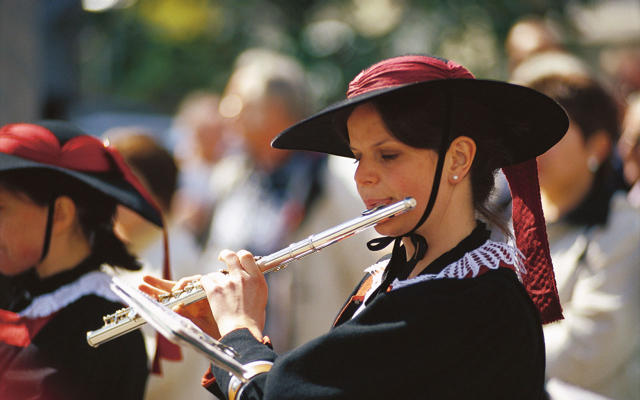 A woman playing the fluteat an event